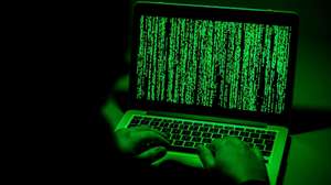epa07261857 ILLUSTRATION - A person sits in front of a computer screen in Moers, Germany, 04 January 2019. Reports on 04 January 2019 state personal data of hundreds of German politicians, celebrities and journalists have been hacked and posted online. The compromised data reportedly includes credit card details, private chat protocols and contact information. The data was allegedly shared via a Twitter account under the name G0d (@_0rbit) prior to Christmas 2018, which has been suspended in the meantime.  EPA/SASCHA STEINBACH
