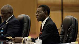 epa11375158 President of Equatorial Guinea Teodoro Obiang Nguema Mbasogo (R) and Chinese President Xi Jinping (not pictured) attend a meeting at the Great Hall of the People in Beijing, China, 28 May 2024.  EPA/TINGSHU WANG / POOL