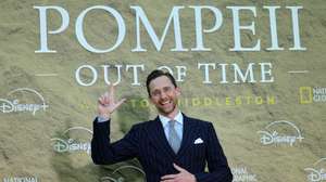 epa13115936 British actor Tom Hiddleston attends the 'Pompeii: Out of Time' premiere at the British Museum in London, Britain, 16 July 2026. The three-part series will be available to stream on Disney+ and Hulu from 23 July 2026.  EPA/ANDY RAIN