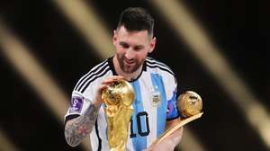 epa13202782 (FILE) - Lionel Messi of Argentina touches the World Cup trophy as he passes it after winning the golden ball award during the awards ceremony after the FIFA World Cup 2022 Final between Argentina and France at Lusail stadium, Lusail, Qatar, 18 December 2022 (Reissued 31 August 2026). Lionel Messi announed his retirement from international soccer on 31 August 2026.  EPA/FRIEDEMANN VOGEL