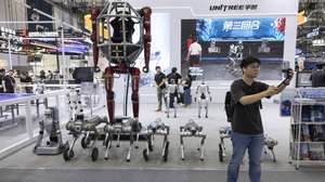 epa13178569 An attendee takes a selfie in front of the Unitree stand during the 2026 World Robot Conference in Beijing, China, 19 August 2026. The 2026 World Robot Conference is held in Beijing from 19 to 23 August.  EPA/ANDRES MARTINEZ CASARES