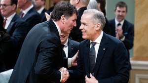 epa11964337 Canadian Prime Minister Mark Carney (R) shares a moment with Minister of International Trade and Intergovernmental Affairs and President of the King's Privy Council for Canada, Dominic LeBlanc, during a swearing in ceremony at Rideau Hall in Ottawa, Canada, 14 March 2025. Carney is taking over from outgoing Prime Minister Justin Trudeau after winning a Liberal Party leadership election last weekend.  EPA/SPENCER COLBY