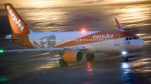 epa08790250 An EasyJet plane, starting as the first commercial flight since the airport’s opening, drives on the apron towards the tarmac, a day after the official opening of BER Berlin Brandenburg Airport in Schoenefeld, Germany, 01 November 2020. The BER airport was opened on 31 October 2020 nearly nine years after it was supposed to open in the year 2011. A series of technical issues and general mismanagement led to a six-time postponement of the opening. On 31 October 2020 two planes landed during the opening ceremony, 24 years after the construction decision of the airport was made.  EPA/CLEMENS BILAN