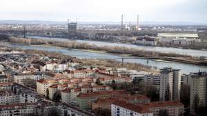 epa09070082 A general view of Vienna’s Kaisermuehlen neighbourhood and the Danube river (Donau) is seen from the IAEA headquarters of the UN seat in Vienna, Austria, 12 March 2021.  EPA/CHRISTIAN BRUNA