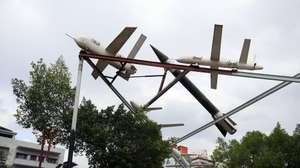 epa13176149 Mock missiles and drones made by Yemen's Houthis are displayed in a square in Sana'a, Yemen, 17 August 2026. Yemen's Houthis claimed responsibility for a missile attack on Saudi vessels near the strategic Bab al-Mandab Strait amid regional tensions, according to Houthi military spokesman Yahya Saree.  EPA/YAHYA ARHAB