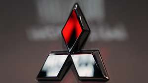 epa11326270 The Mitsubishi Motors logo is seen on a vehicle displayed at a carmaker showroom in Tokyo, Japan, 08 May 2024. Mitsubishi Motors Corporation announced its full-year financial results for FY2023, showing that its consolidated net sales for the full fiscal year rose 13 percent year on year.  EPA/FRANCK ROBICHON