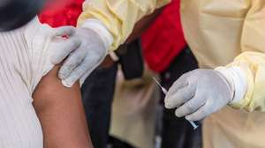 epa11644023 A medical staff prepares to innoculate a person for smallpox and mpox with a vaccine made by Danish drugmaker Bavarian Nordic in a symbolic start of the mpox vaccination campaign at Goma General Hospital, in Goma, Democratic Republic of Congo, 05 October 2024. The Democratic Republic of Congo received 265,000 doses of the MVA-BN vaccine donated by the European Commission's Health Emergency Preparedness and Response Authority, Gavi, the Vaccine Alliance, and the US government. According to the RDC Health Minister Samuel-Roger Kamba, the country has recorded more than 30,000 mpox cases, with 988 deaths.  EPA/MOISE KASEREKA