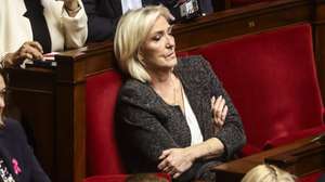 epa12453120 President of Rassemblement National parliamentary group Marine Le Pen listens to the prime minister's general policy statement at the National Assembly in Paris, France, 14 October 2025. Lecornu announced his new government on 12 October, one week after his first resignation. The National Rally (RN) and La France Insoumise (LFI)  announced motions of censure against this new government on 13 October.  EPA/Teresa Suarez