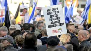 epa12448747 People take part in a national march organized by the Alliance for Peace in the Middle East, in Brussels, Belgium, 12 October 2025. The rally commemorated the victims of the 07 October 2023 Hamas attacks in Israel and condemned antisemitism.  EPA/FREDERIC SIERAKOWSKI