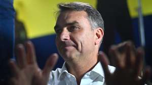 epa13285947 Brazilian presidential candidate Flavio Bolsonaro reacts during the announcement of support from former conservative Goias Governor Ronaldo Caiado for the second round of the Brazilian elections, in Goiania, Brazil, 06 October 2026. The former governor called for defeating Lula's PT (Workers' Party) in the presidential runoff, amid chants of 'minister, minister, minister' from his supporters urging him to join a potential cabinet led by the far-right senator.  EPA/Andre Borges