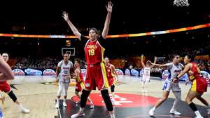 epa13225642 China's Zhang Ziyu (C) in action during the FIBA Women's World Cup 2026 match between Puerto Rico and China in Berlin, Germany, 09 September 2026.  EPA/FILIP SINGER