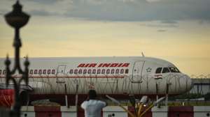 epa09515052 An Air India aircraft prepares to take off at Chennai International Airport, in Chennai, India, 09 October 2021. After 68 years, Tata Sons retake the debt-laden national carrier Air India by winning the bid with 180 billion rupees (2.4 billion US dollars). The Tata conglomerate will own a 100 percent stake in Air India.  EPA/IDREES MOHAMMED