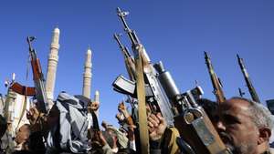 epa13292237 Houthi supporters hold up weapons during a protest against Saudi Arabia, in Sana'a, Yemen, 09 October 2026. Thousands of Houthi supporters rallied in Sana'a to protest against Saudi Arabia amid an escalation in fighting after Yemen's Saudi-backed government announced a military campaign on 04 October to retake Houthi-held territory.  EPA/YAHYA ARHAB