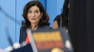 epa09999205 New York Governor Kathy Hochul arrives for a bill signing ceremony for new gun safety legislation at a community center in the Bronx borough of New York, New York, USA, 06 June 2022. The new laws were passed by state lawmakers last week and implement new gun safety regulations including raising the minimum age to purchase a semiautomatic rifle to 21, broadening the state's 'red flag' law that allows courts to seize the weapons of anyone determined to be a danger to themselves or to others, and restricting the sale of bullet proof vests.  EPA/JUSTIN LANE