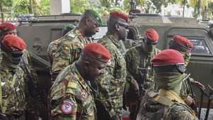 epa09468485 Guinea's special forces commander and junta president Colonel Mamady Doumbouya (C) arrives for the opening of a national consultation framework between the military junta and socio-political spheres in Conakry, Guinea 14 September 2021. Guinea's junta president Colonel Mamady Doumbouya who ousted President Alpha Conde on 05 September 2021 opened the national consultation framework between military junta and socio-political spheres as the country moves towards the next phase following the coup.  EPA/STR