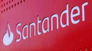 epa12690230 Santander logo outside a branch in London, Britain, 29 January 2026. Santander Bank has announced it is set to close forty-four branches, resulting in job losses of over 290.  EPA/ANDY RAIN