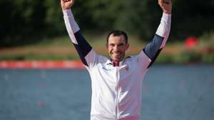 epa13200720 Gold medalist Fernando Pimenta of Portugal celebrates on the podium of the Men's K1 5000m at the ICF Canoe Sprint &amp; Paracanoe World Championships at the Malta Regatta Course in Poznan, Poland, 30 August 2026.  EPA/Jakub Kaczmarczyk POLAND OUT
