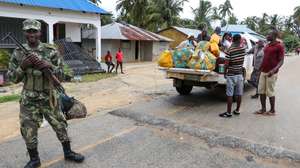 epa09131124 Residents try to return to normality in Palma, Cabo Delgado, Mozambique, 12 April 2021. The violence unleashed more than three years ago in Cabo Delgado province escalated again about two weeks ago, when armed groups first attacked the town of Palma.  EPA/JOAO RELVAS