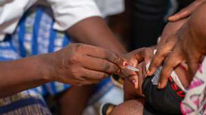 epa11096741 A nurse vaccinates a child against malaria in Nyalla Medical Centre in Douala, Cameroon, 22 January 2024. A new malaria vaccine, known as RTS,S, or Mosquirix, made by GlaxoSmithKline, is being rolled out for the first time as an immunization campaign for children in Cameroon. According to the World Health Organisation, the WHO African Region, with an estimated 233 million cases in 2022, accounted for about 94% of cases globally. Malaria is highly endemic in Cameroon and the WHO estimates that about 11,000 people die from malaria in Cameroon every year.  EPA/DONGMO RODRIGUE WILLIAM