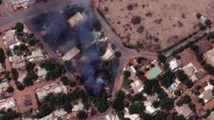 epa10577401 A handout satellite image made available by Maxar Technologies shows burning buildings and a millitary patrol northeast of Khartoum International Airport, in Khartoum, Sudan, 17 April 2023. Heavy gunfire and explosions were reported in Sudan's capital Khartoum since 15 April between the army and a paramilitary group following days of tension centering around the country's proposed transition to civilian rule.  EPA/MAXAR TECHNOLOGIES HANDOUT -- MANDATORY CREDIT: SATELLITE IMAGE 2023 MAXAR TECHNOLOGIES -- THE WATERMARK MAY NOT BE REMOVED/CROPPED -- HANDOUT EDITORIAL USE ONLY/NO SALES