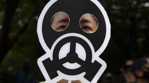 epa10733855 A member of civic groups takes part in a rally against the International Atomic Energy Agency's (IAEA) report on Japan's disposal of Fukushima radioactive water, outside the Foreign Affairs Ministry in Seoul, South Korea, 08 July 2023. IAEA director general arrived in Seoul to discuss the IAEA's recently released report on Japan's plan to discharge treated radioactive water from a damaged nuclear power plant in Fukushima.  EPA/JEON HEON-KYUN