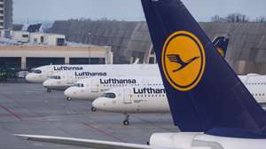 epa11203503 Airplanes of German airline Lufthansa are parked at the international airport in Frankfurt am Main, Germany, 07 March 2024. Despite five rounds of collective bargaining with the Federal Association of Aviation Security Companies (BDLS), Lufthansa employees went on strike over the lack of an agreement on wage increases for the approximately 25,000 aviation workers nationwide.  EPA/CHRISTOPHER NEUNDORF