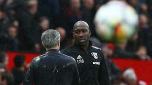 epa06671544 West Bromwich's manager Darren Moore (R) talks with Manchester United's manager Jose Mourinho (L) during the English Premier League soccer match between Manchester United and West Bromwich Albion at Old Trafford in Manchester, Britain, 15 April 2018.  EPA/NIGEL RODDIS EDITORIAL USE ONLY. No use with unauthorised audio, video, data, fixture lists, club/league logos 'live' services. Online in-match use limited to 75 images, no video emulation. No use in betting, games or single club/league/player publications.