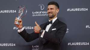epa11294683 Serbian tennis player Novak Djokovic poses for photographers after receiving the '2024 Laureus World Sportsman of the Year' award during the 2024 Laureus World Sports Awards ceremony, in Madrid, Spain, 22 April 2024.  EPA/JUANJO MARTIN