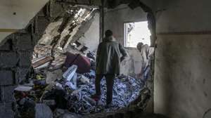 epa11970914 Palestinians inspect a destroyed area of Al Tabien school following Israeli airstrikes in Gaza City, 18 March 2025. The Israeli forces on 18 March confirmed they were carrying out 'extensive strikes' on targets in the Gaza Strip, following an Israeli prime minister's statement which ended the ceasefire in place since 19 January. According to provisional figures released by the Palestinian Health Minister, more than 250 people were killed in a series of overnight strikes in the Gaza Strip, with more bodies still waiting to be recovered from under the rubble.  EPA/MOHAMMED SABER