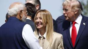 epa13041237 Italy's Prime Minister Giorgia Meloni (C) chats with Prime Minister of India Narendra Modi (L), next to US President Donald Trump (R) at Hotel Royal during the G7 Summit in Evian-les-Bains, France, 16 June 2026. The 52nd G7 Summit takes place in Evian-les-Bains from 15 to 17 June 2026.  EPA/YOAN VALAT