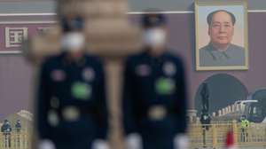 epa09814019 Security personal stand guard on Tiananmen Square for the closing session of the Chinese People's Political Consultative Conference (CPPCC) in front of the Great Hall of the People, in Beijing, China, 10 March 2022. China holds two major annual political meetings, The National People’s Congress (NPC) and the Chinese People's Political Consultative Conference (CPPCC) which run alongside and together known as 'Lianghui' or 'Two Sessions'.  EPA/ALEX PLAVEVSKI