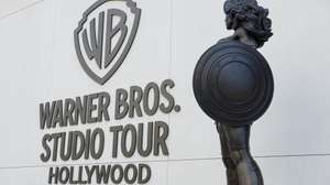 epa12471313 A statue stands neaby the Warners Bros. studio tour location at the Warner Bros. Studio Lot in Burbank, California, USA, 21 October 2025. Warner Bros. Discovery revealed in a press release on 21 October that it is putting the company up for sale.  EPA/CAROLINE BREHMAN