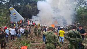 epa12844942 Members of the Colombian Armed Forces, rescue workers, and volunteers are conducting rescue operations at the crash site of a Colombian Air Force Hercules C-130 aircraft in Puerto Leguizamo, Colombia, 23 March 2026. At least eight people died and 83 were injured, 14 of them in critical condition, in the plane crash of a Colombian Air Force (FAC) Hercules C-130 aircraft with 125 people on board, according to preliminary reports from the regional government.  EPA/MiPutumayo.com.co BEST QUALITY AVAILABLE