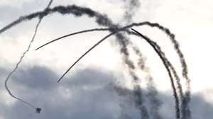 epa12851382 Israel's air defense system intercepts projectiles launched towards northern Israel amid cross-border fire, as seen from the Upper Galilee, in northern Israel, 26 March 2026. Israel resumed operations in Lebanon in early March 2026, targeting Hezbollah's infrastructure and personnel.  EPA/ATEF SAFADI