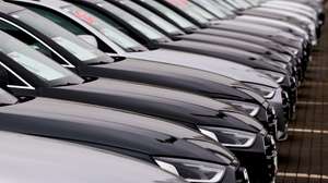 epa11696120 Cars by German automotive company Audi are displayed at an Audi car dealer, in Berlin, Germany, 01 November 2024. According to a report by the German Association of the Automotive Industry (VDA), the shift of the German car industry to produce electric vehicles could cost around 186,000 jobs by 2035, of which a quarter have already been lost.  EPA/FILIP SINGER