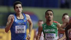 epa09835695 Pietro Arese of Italy (L) and Isaac Nader of Portugal (R) compete in the men’s 1500m heats at the World Athletics Indoor Championships in Belgrade, Serbia, 19 March 2022.  EPA/ANDREJ CUKIC