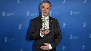 epa10491462 Joao Canijo poses with the Silver Bear Jury Prize during the Closing and Awards Ceremony of the 73rd Berlin International Film Festival 'Berlinale' in Berlin, Germany, 25 February 2023. The in-person event ran from 16 to 26 February 2023.  EPA/MICHAEL TIMM / POOL