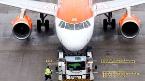 epa11219659 An Easyjet airplane at the Berlin Brandenburg Airport during an aviation security staff warning strike in Berlin, Germany, 14 March 2024. United Services Trade Union (ver.di) has called on aviation security personnel to go on a 24-hour warning strike. All flights from Berlin Brandenburg Airport are cancelled.  EPA/FILIP SINGER