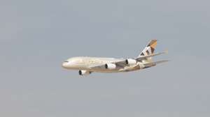 epa12531840 Airbus A380 Aircraft owned by Etihad Airways performs during the flying displays as part of Dubai Airshow 2025 at Dubai World Central - Al Maktoum International Airport, in Jebel Ali, Dubai, United Arab Emirates, 17 November 2025. The 19th edition of the Dubai Airshow 2025 runs from 17 to 21 November with the participation of around 150 countries and more than 1,500 exhibitors, over 200 aircraft in the flying and static display, and 450 speakers in the conferences.  EPA/ALI HAIDER