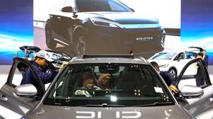 epa13141117 Visitors sit in an electric car Atto 3 made by Chinese automotive manufacturer BYD at the Gaikindo Indonesia International Auto Show (GIIAS) 2026 in Tangerang, Banten province, Indonesia, 30 July 2026. The annual auto show runs from 30 July to 09 August 2026.  EPA/MAST IRHAM