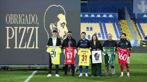 Estoril Praia's Pizzi (C/L) poses with shirts from his former clubs during his end of career farewell ceremony after the Portuguese First League soccer match between Estoril Praia vs SL Benfica, held at Antonio Coimbra da Mota stadium in Estoril, Portugal, 16 May 2026. JOSE SENA GOULAO/LUSA