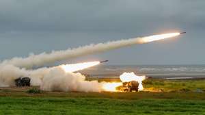 epa13027503 Taiwan military US-made M142 High Mobility Artillery Rocket Systems (HIMARS) fire during 'heavy artillery firing and new weapon replacement verification firing training' in Taichung, Taiwan, 10 June 2026. The drill aimed to strengthen the combat capability of the Taiwanese military.  EPA/RITCHIE B. TONGO