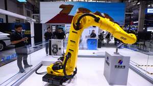 epa13182585 An industrial robot arm is displayed at the Beijing Jingcheng Machinery Electric Company stand during the 2026 World Robot Conference in Beijing, China, 21 August 2026. The WRC event runs from 19 to 23 August.  EPA/WU HAO
