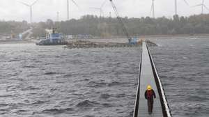 epa10194075 The final construction phase works of LNG mooring are seen in quay near Paldiski, Estonia, 19 September 2022.  The LNG terminal in Paldiski will consist of three parts, a port, a pipeline connection of Elering with the Balticconnector pipeline and an LNG vessel. Investment and energy companies Estonian Alexela and Infortar, which started preparations for the work immediately after the start of the war in Ukraine, are responsible for the completion of the quay and port facilities. Estonia&#039;s LNG terminal construction is going ahead of schedule, the 200-square-meter Paldiski LNG terminal platform extension was handed over to transmission operator Elering 10 days ahead of schedule. The last stage, which includes moorings for vessels, still needs to be added to the structure. Alexela and Infortar handed over the main platform at Paldiski&#039;s Pakrineeme Harbor at the end of August and 133 pipes now need to be laid by Elering. The terminal, in western Estonia, consists of a port, Elering&#039;s pipeline with the Balticconnector natural gas pipeline, and the ship.  EPA/TOMS KALNINS