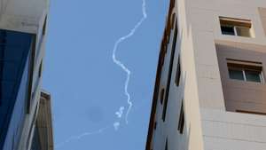 epa12783583 Smoke from an intercepted missile is pictured in the sky over Doha, Qatar, 28 February 2026. Qatar announced a successful defence against rocket attacks on its state territory. Iran retaliated with attacks across the Gulf countries after joint US and Israeli military attacks on Iran on 28 February 2028.  EPA/Hannibal Hanschke