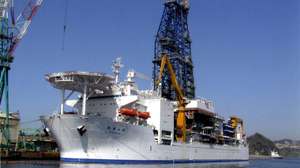 epa000492384 Deep-sea drilling vessel Chikyu berths at the Nagasaki dockyard of Mitsubishi Heavy Industries in Nagasaki Province, Friday 29 July, 2005. The vessel will attempt to drill to the deepest depth in the Earth to uncover mysteries below the planet's crust. The 210-meter, 57,087-ton ship is estimated to be capable of drilling 7,000 meters below the seabed.  EPA/MITSUBISHI JUKO/HANDOUT