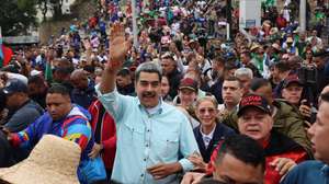 epa12583973 Venezuelan President Nicolas Maduro (C) participates in a demonstration organized by the United Socialist Party of Venezuela (PSUV) in Caracas, Venezuela, 10 December 2025. While government supporters rallied in the streets, opposition leader Maria Corina Machado, prevented from running for office by President Nicolas Maduro's administration, was awarded the 2025 Nobel Peace Prize in today’s ceremony in Oslo.  EPA/MIGUEL GUTIERREZ