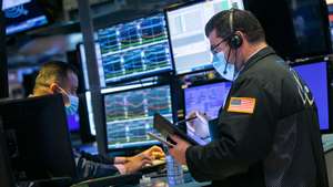 epa08798733 A handout photo made available by the New York Stock Exchange (NYSE), showing 
traders working at the New York Stock Exchange (NYSE) on 04 November 2020, while the US presidential election awaits a final result. The 2020 Presidential Election result remains undetermined as votes continued to be counted in several key battleground states.  EPA/COURTNEY CROW HANDOUT  HANDOUT EDITORIAL USE ONLY/NO SALES