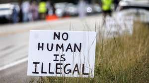 epa12499868 A anti-immigration sign is displayed during a protest at the entrance to the Alligator Alcatraz detention center in Ochopee, Florida, USA, 02 November 2025. Florida activists join communities across the country for the National Day of Action to End Detention and Deportation, demanding the release of all those detained and an end to the United States Immigration and Customs Enforcement (ICE) sweeps that are breaking families apart.  EPA/CRISTOBAL HERRERA-ULASHKEVICH