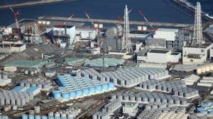 epa09131838 An aerial view shows tanks containing contaminated water at the Fukushima Daiichi nuclear power plant, which suffered meltdowns on 11 March 2011, in Fukushima prefecture, northeastern Japan, 14 February 2021 (reissued 13 April 2021). On 13 April 2021, the Japanese government officially decided to release treated water containing tritium from the crippled Fukushima Daiichi Nuclear Power Plant into the ocean.  EPA/JIJI PRESS JAPAN OUT EDITORIAL USE ONLY/  NO ARCHIVES